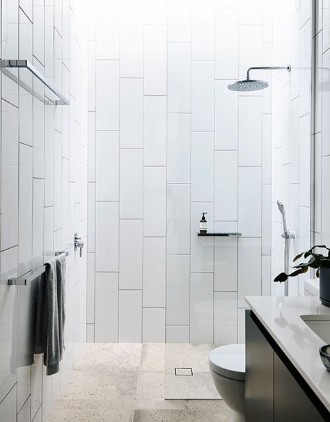 Bathroom Tile Design Idea - Oversized Subway Tiles Installed Vertically Instead Of Horizontally Subway Tile Showers, Subway Tiles Bathroom, Minimal Interior Design, Bright Bathroom, Bathroom Tile Designs, Bathroom Tiles, Beach Bathrooms, Minimalism Interior, Tile Installation