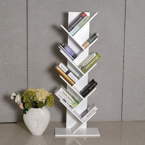 Inspired by the look of a tree expanding its branches, our bookcase is filled with natural vibes and that's exactly what you need in your room. It has a multi-tier design, it can make the most of any space and store as many books as possible. Made from premium particle boards, our bookshelf is built to last. Book Stand Design, Rustic Floor, Stylish Room Decor, Custom Bookshelves, Natural Vibes, Bookshelves In Bedroom, Tree Bookshelf, Small Bookshelf, Living Room Tv Unit Designs