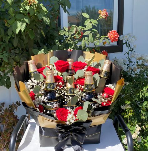 Beer And Rose Bouquet 🌹✨ These have become a Popular Order & I am not mad about it! 🖤🍺 We can customize this to include any drink of your choice. They are also a great display piece as well even after removing the drinks🤍 perfect gift for any occasion ✨ #beerstagram #beerbouquet #beerarrangement #modelo #cerveza #giftsforhim #parael #floresnaturais Beer Bouquet, Rose Bouquet, Bouquets, Gifts For Him, Beer, Perfect Gift, Drinks, Canning, Gifts