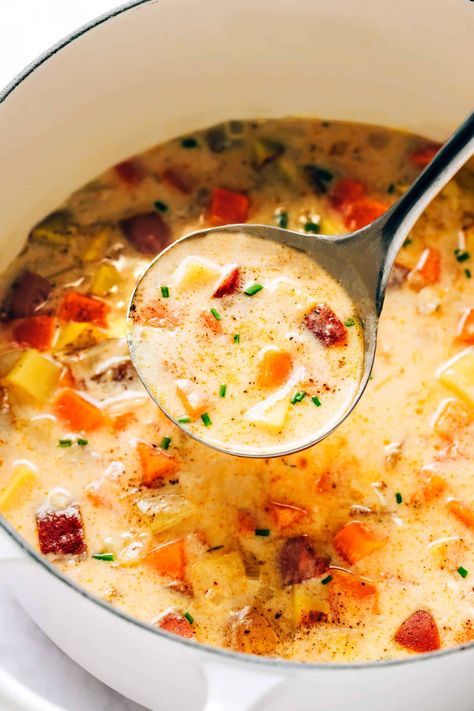 This Three Potato Soup is made with a zesty, creamy cheddar broth and a sweet and savory combination of Yukon gold potatoes, red potatoes, and sweet potatoes. Easy to make in about 30 minutes and always so delicious and comforting! Feel free to leave the soup vegetarian, or add in some bacon, ham, sausage or chicken if you prefer. (Gluten-free and vegan options included too.) | gimmesomeoven.com Potatoes And Sweet Potatoes, Soup Vegetarian, Potatoes Easy, Gold Potatoes, Gimme Some Oven, Potato Vegetable, Yukon Gold, Potato Soup Recipe, Yukon Gold Potatoes