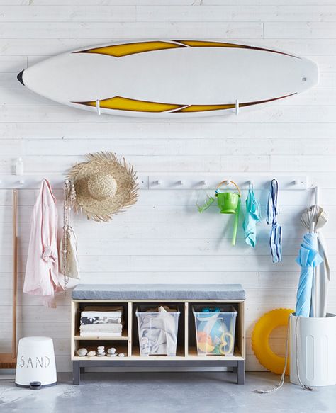 Keep beach gear stored with a rack for a surfboard, a seat to change with boxes… Beach Gear Storage, Outdoor Mudroom, Ikea Samla, Ikea Storage Solutions, Ocean Clock, Furniture Budget, Cottage Storage, Beach Hut Decor, Beach Storage