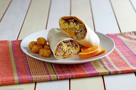 🌯 Copycat Sonic Ultimate Meat and Cheese Burrito | #Food #Recipe via CopyKat Recipes Meat And Cheese Burrito, Cheese Burrito, Fluffy Scrambled Eggs, Breakfast Burritos Recipe, Bacon In The Oven, Cheese Breakfast, Breakfast Burrito, Burritos Recipe, Copykat Recipes