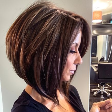 Voluminous Angled Bob with Layered Crown Stacked Bob Haircut With Layers, Angled Bob Haircuts Brunette, Brown Angled Bob, Short Angled Bob With Curtain Bangs, Back Of Stacked Bob Haircut, Choppy Layered Bob Hairstyles Medium, Stacked Brunette Bob, Graduated Layered Bob Haircuts, Angeles Bob Haircut