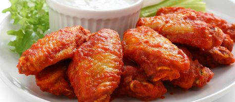 Frank’s Red Hot Buffalo Wings Authentic Recipe | TasteAtlas Maryland Chicken, Hot Wing Sauce Recipe, Red Hot Chicken, Glazed Wings, Hot Chicken Wings, Buffalo Hot Wings, Hot Wing Recipe, Wings Recipes, Hot Wing Sauces