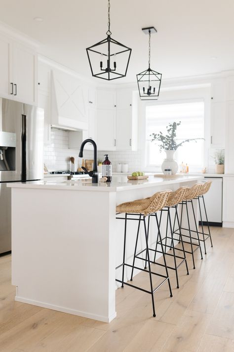 Small White Kitchen Black Hardware, White Farmhouse Kitchen Black Hardware, White Quartz White Cabinets, Pendant Lights Over Kitchen Island Scandinavian, White Kitchen Light Wood Floors Black Hardware, White With Black Hardware Kitchen, Coastal Kitchen With Black Hardware, White Kitchen With Black Hardware Modern, All White Kitchen With Black Hardware