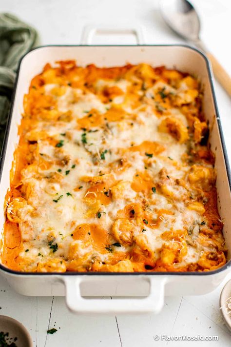 Hot cheesy tortellini bake features Italian sausage, pillowy tortellini and fresh garlic to tie all of the flavors together. It’s the ultimate comfort food after a long day and you can save the leftovers for lunches throughout the week. Cheesy Tortellini Bake, Italian Sausage Casserole, Cheesy Casserole Recipes, Cheesy Tortellini, Tortellini Bake, Sausage Tortellini, Tortellini Recipes, Tortellini Pasta, Sausage Bake