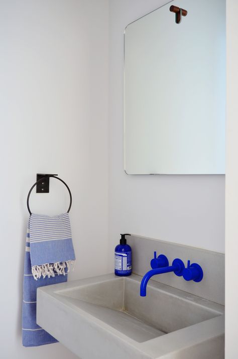 A bright cobalt blue Vola faucet provides a splash of color in the powder room. Vola Faucet, Interior Design Color, Home Remodel, Blue Bathroom, Cheap Decor, Interior Inspo, Cheap Home Decor, Bathroom Inspiration, 인테리어 디자인