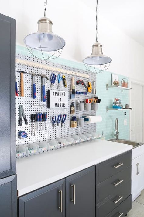 This is what a garage looks like with a female touch! Inspired ideas to makeover a garage. Peel and stick tile, contact paper counters, pegboard organization, utility sink, shelving, track storage, and even task lighting! See the before and after garage makeover. #garageorganization #porchdaydreamer #garage #pegboard #utilitysink #tasklighting #garagestorage Garage Storage Inspiration, Garage Organization Tips, Garage Organisation, Garage Renovation, Garage Storage Solutions, Garage Organization Diy, Garage Remodel, Diy Garage Shelves, Diy Garage Storage