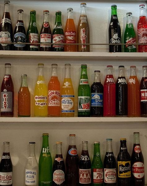 Soda Bottle Aesthetic, Vintage Soda Shop Decor, Glass Soda Bottles Aesthetic, Soda Bottles Aesthetic, Old Soda Bottles, Glass Soda Bottles, Soda Vending Machine, Vintage Soda Bottles, Decor Shelves