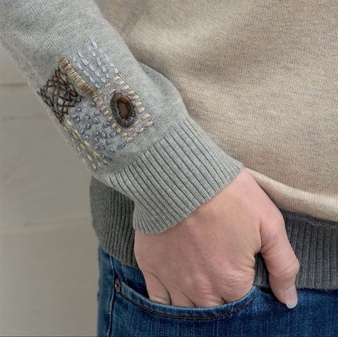 Hole in a sweater? Why hide it (or toss it) when you can visibly mend it? Check out more fun ideas for fabric repair in Visible Mending,… Clothes Embroidery, Mending Clothes, Make Do And Mend, Sashiko Embroidery, Visible Mending, Repair Clothes, Book Quilt, June 1, Embroidery Patches