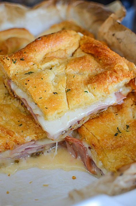 These are the easiest hot ham and cheese sandwiches you'll ever make for dinner! These aren't your typical loaf of bread ham and cheese sandwich! Check them out! - The Salty Pot Hot Ham And Cheese Sandwiches, Hot Ham Sandwiches, Ham And Cheese Sandwiches, Hot Ham And Cheese, Hot Sandwich Recipes, Ham And Cheese Croissant, Hot Sandwiches, Crescent Recipes, Ham Sandwiches