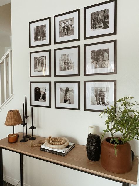 Black Frame Gallery Wall over a wooden console table decorated with organic modern pieces Console Table Decorating, Wooden Console Table, Modern Gallery Wall, Cozy Living Spaces, Target Finds, Gallery Wall Frames, Cozy Kitchen, Target Style, Decorating With Pictures