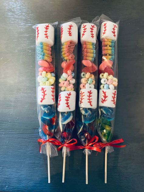 Perfect for any occasion these candy kabobs  are sure to be any kids favorite part of the party  OUR LARGE CANDY KABOBS ARE ROUGHLY ONE FOOT  long each kabob comes individually wrapped! Kids and adults will love these baseball themed candy kabobs  Candy kabobs that are pictured are our large candy kabobs smaller sizes will be similar but not as pictured  WHO WE ARE A&E Candy Jar is a fun company founded in 2019.  We are a small team with a passion for offering yummy products.  We create products Candy On A Stick, Baseball Treats, Baseball Snacks, Baseball Party Favors, Baseball Theme Birthday, Team Snacks, Candy Kabobs, Baseball Theme Party, Baseball Birthday Party