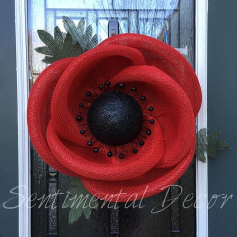 I just finished another poppy wreath. These wreaths are perfect for those honoring our veterans 🇺🇸, and for Wizard of Oz fans alike🌪🌈👠👠!… Poppy Wreath Ideas, Diy Poppy Wreath, Poppy Wreath Craft, Remembrance Day Wreath, Poppy Flower Craft Veterans Day, Buddy Poppy Wreath, Making Poppies For Veterans Day, Wizard Of Oz Wreath, Poppy Decor