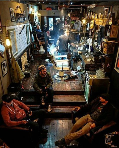 What a cool barber shop interior & relaxed vibe. Anyone know the name of this place or where it's located? Please comment if so. Can't quite make out the lettered signage on the wall at top left. Barber Shop Ideas, Tattoo Shop Interior, Tattoo Studio Interior, Barber Shop Interior, Barbershop Design, Tattoo Old School, Barber Shop Decor, Salon Suites, Studio Interior