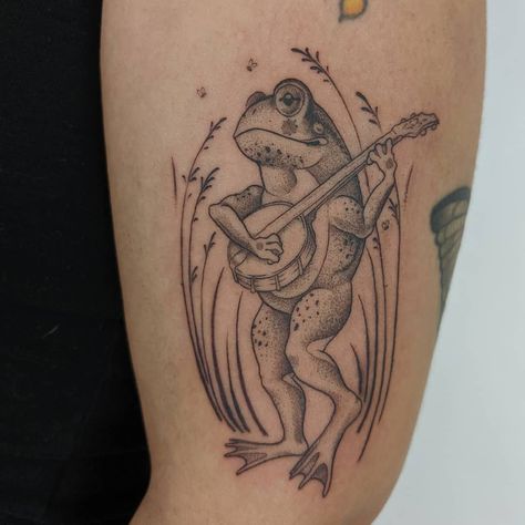 Bullfrog Tattoo, Frog Playing Guitar Tattoo, Frog Playing Banjo Tattoo, Frog With Banjo Tattoo, Banjo Tattoo, Frog Banjo, Sweet Frog, Cowboy Tattoos, Books Open