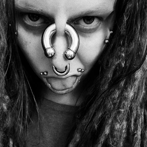 Floating Nomad, Emo Piercings, Crazy Piercings, Body Modification Piercings, Stretched Septum, Facial Pictures, Bridge Piercing, Septum Piercing Jewelry, Men Tattoos Arm Sleeve