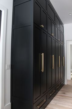 Black Cabinets Butlers Pantry, Small Mud Room Cabinets, Black Cabinetry Kitchen, Black Cabinets Office, Tricorn Black Kitchen Cabinets, Black Mudroom Cabinets, Tricorn Black Cabinets, Black Mud Room, Butlers Pantry Door