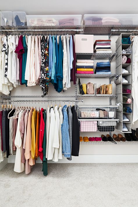 This space implements several smart walk-in closet organization ideas: hanging bars, cubby storage, and drawers help organize clothing. #organization #closetorganization #closetideas #bhg Organizing Walk In Closet, Organiser Son Dressing, How To Organize Your Closet, Best Closet Organization, Closet Clothes Storage, Closet Clutter, Organized Closet, Small Closet Space, Walking Closet