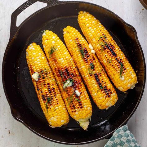 Skillet Charred Corn on the Cob - The Real Recipes Cast Iron Corn On The Cob, Cast Iron Corn, Skillet Corn On The Cob, Charred Corn, Charred Corn On The Cob, How To Grill Corn On The Cob On Stove, Skillet Corn, Cast Iron Oven, How To Make Corn