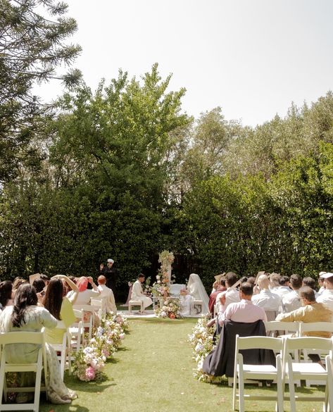 The most dreamy garden ceremony setup⁠ ⁠ One thing I love about these pictures is that you can see Samiha and Sohail's family and friends sitting and soaking in every moment in an unplugged ceremony⁠ ⁠ Photography: @ngcreativestudio⁠ Venue: @burnhamgroveestate⁠ Decor: @nokshaevents⁠ Bouquet: @springfull_⁠ Makeup: @mariamzafarbridal⁠ Bridal Outfit: @abhishekh_n_radhika⁠ Wedding Rings: @austenandblake⁠ Bridal Jewellery: @sgjewelz⁠ Nikkah Certificate: @calligraphybyaiman⁠ Desi Nikkah Decor, Garden Nikkah Decor, Intimate Nikkah Decor, Outside Nikkah, Simple Nikkah Decor, Outdoor Nikkah Decor, Garden Nikkah, Nikah Setup, Backyard Nikkah