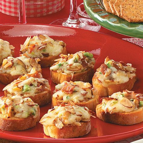 Almond-Bacon Cheese Crostini Recipe -For a change from the usual toasted tomato appetizer, try these baked bites. If you like, slice the baguette at an angle instead of making a straight cut. —Leondre Hermann, Stuart, Florida Cheese Crostini, Crostini Recipes, Finger Food Appetizers, Snacks Für Party, Bacon Cheese, Food List, Party Food Appetizers, Appetizers For Party, Finger Food