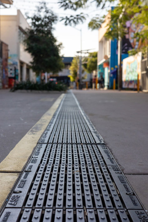 Engineered to handle heavy water flow, our channel drains are the ultimate choice for effective water runoff management. Whether it's a residential or commercial project, our robust & durable channel drains ensure proper water drainage. With their sleek and modern design, these drains seamlessly blend into any landscape, providing both functionality and aesthetic appeal. Discover the power of efficient stormwater drainage with our channel drainage systems. Street Drainage Design, Water Management Diagram, Storm Water Management Landscape Architecture, Sustainable Urban Drainage Systems, Underground Cistern Water System, Water Flow, Modern Design, Water, Design