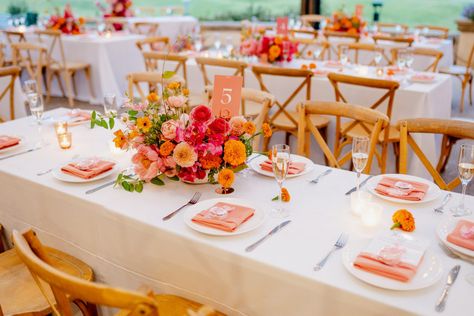 Wedding Colorful Centerpieces, Tangerine And Pink Wedding, Wedding Place Settings Colorful, Pink And Orange Wedding Table Setting, Sunset Wedding Decorations, Bright Wedding Aesthetic, Pink And Orange Wedding Centerpieces, Sunset Garden Party, Wedding Floral Centerpieces Round Table