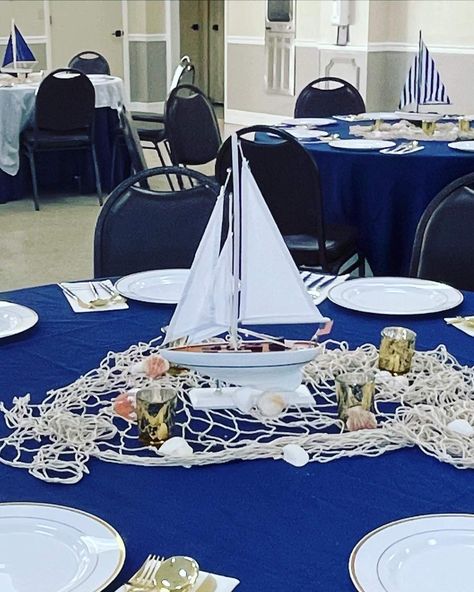 Boat Centerpiece Ideas, Cruise Themed Party Ideas Decoration, 50th Birthday Party Boat Theme, Sailing Into Retirement Party, Cruise Ship Party Table Decorations, Yatch Decor Birthday, Sailboat Party Decorations, Yacht Rock Party Decor, Cruise Themed Party Ideas