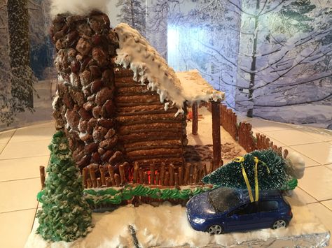 Gingerbread Log Cabin 2017, side, car w/ tree, chimney Gingerbread House With Pretzels, Gingerbread House Log Cabin Ideas, Gingerbread Cabin Ideas, Gingerbread Log Cabin House Ideas, Pretzel House Log Cabins, Cabin Gingerbread House Ideas, Log Cabin Gingerbread House Ideas, Homemade Gingerbread House Ideas, Fun Gingerbread House Ideas