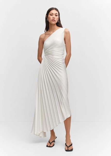 MARIA'S STYLE PLANET: Asymmetrical pleated dress Pleated Fabric, Pleated Midi Dress, Asymmetrical Design, British Indian, Asymmetric Hem, Pleated Dress, Brunei, Long Skirt, Long Dress