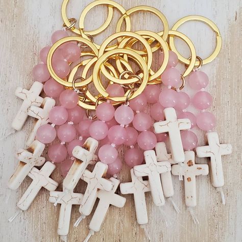 "Handmade cross keychains 3 10mm smooth round rose quartz beads  20mm x 30mm cream howlite cross Gold keyring 1.25\" White nylon thread Approx length 4 inches" Womens Retreat Favors, Womens Retreat Gifts, Confirmation Favors, Baptism Favors Girl, Cross Favors, Purse Charms Diy, Recuerdos Primera Comunion Ideas, Confirmation Party, Retreat Gifts