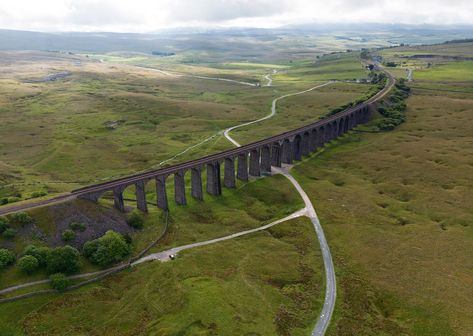 Ribblehead viaduct aerial image - completed 1874. Over 100 men lost their lives during its construction. North Yorkshire UK Ribblehead Viaduct, Wedding Workout, Yorkshire Uk, Aerial Images, North Yorkshire, Layout Ideas, Design Decor, North East, Wales England