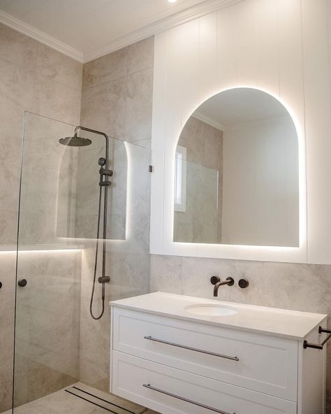 How incredible is this bathroom space by @NavyBoxConstructions?! Achieving the spa like feeling with the Posh Solus back-to-corner bath paired with the timeless white shaker style Kado Lux vanity. Contrasted by the Milli Pure tapware in brushed gunmetal with beige, textured tiles for a bright and inviting bathroom. 

Reece featured products 🛁 :
Milli Pure tapware, Milli Mood shower, Kado Lux vanity, Posh Solus back-to-corner freestanding bath. Brushed Gunmetal Bathroom, White And Beige Bathroom, White Shaker Vanity, Gunmetal Tapware, Inviting Bathroom, Reece Bathroom, Textured Tiles, Shaker Vanity, Corner Bath