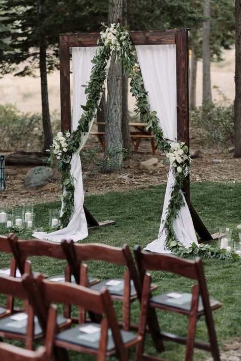 Wedding Arbor with eucalyptus garland and flowers #weddings #weddingcolors #weddingideas #springwedding #himisspuff #neutral #greenery #greeneryweddings Wedding Altar Decorations, Vintage Outdoor Weddings, Wedding Arches Outdoors, Wedding Arbors, Garland Wedding Decor, Wedding Arbor, Rustic Outdoor Wedding, Wedding Arbour, Wedding Altars