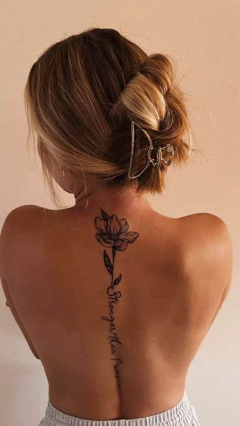 Sunflower Spine Tattoo Quotes, Flower Spine Tattoos For Women Quotes, Spins Tattoos For Women, Tulip Spine Tattoo, Spine Tatoos Woman, Word Spine Tattoo, Back Tattoo Women Spine Meaningful, Meaningful Spine Tattoos, Women Back Tattoo Ideas