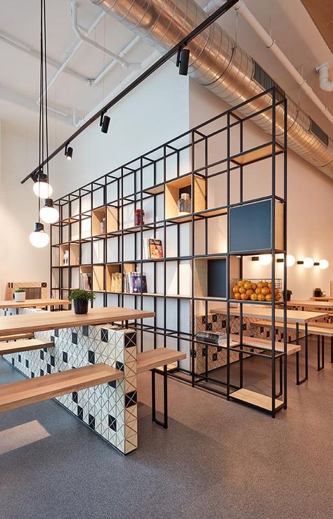 Lebkov and Sons Café opens in Amsterdam | Wallpaper* Partition Design For Cafe, Cafe Partition Design, Restaurant Shelving, Industrial Style Decor, Storage Shelving, Lan Can, Coffee Shop Design, Partition Design, Cafe Interior Design