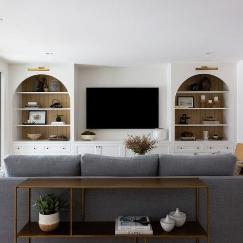 Bright and airy living room design Living Room Tv Not Focal Point, Media Room Cabinet Ideas, Built In Media Wall Basement, Amber Interiors Tv Room, Media Wall Built In Ideas, Recessed Tv Cabinet, Media Console Built In, Large Tv Built In, Built In Shelves Tv Wall