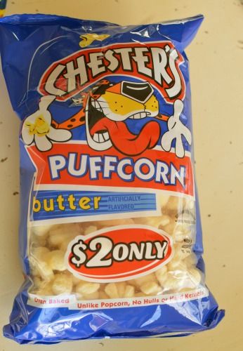 Chester's Puffcorn Cheeto Puffs With White Chocolate, Chesters Puffcorn Recipes, Chester Cheetos, Puffed Corn Recipes, Dorm Snacks, Best Popcorn, Adventure Party, Chocolate Popcorn, Treats Recipes