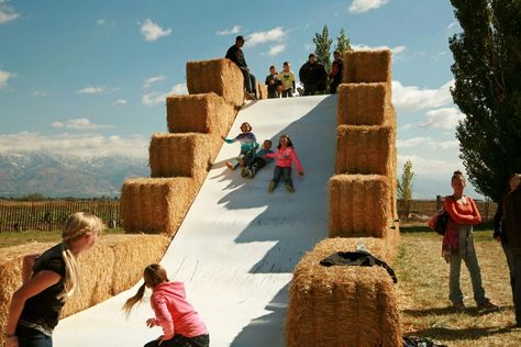 Farm Photography Ideas, Farm Agritourism, Corn Maze Entrance, Farm Themed Playground, Hay Bale Pyramid, Fall Table Settings Autumn, Field With Hay Bales, Indoor Halloween Decor Ideas, Farm Fest