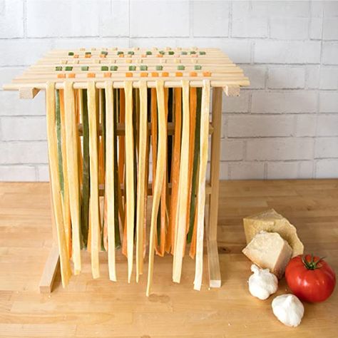 Pasta Drying Rack - Allows air to circulate to dry homemade pasta Pasta Noodle Rack- Up to 12-feet of drying space Constructed of traditional unfinished wood- all natural and safe The perfect companion to your pasta maker machine Pasta Rack, Pasta Drying Rack, Pasta Maker Machine, Pasta Roller, Pasta Pasta, Pasta Maker, Pasta Noodles, Homemade Pasta, Drying Rack