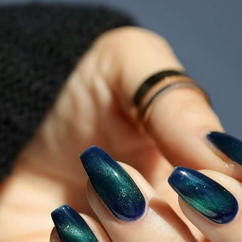 Elissa✨Nail Inspo•DIY Nails•Nail Care on Instagram: "Drown My Demons 🌊🌊🌊✨ Mooncat made this gorgeous deep ocean blue with a green magnetic shimmer and it’s such a vibe (and so satisfying to put on!) Shown in two coats over my natural nails - sun and shade - and the last slide shows this beauty unmagnetized on my thumb. *this collection was sent to me as pr with no obligation to post* #mooncat #drownmydemons #mooncatdrownmydemons #magneticnails #magneticnailpolish #nailinspo #nailpolishinspo #bluenails #nailphotography #nailphoto #nailsoftheday #nailpolishswatch #manicure #naturallight #naturallightphotography #moodynails #darknails #shimmernails" Dark Blue Green Nails, Green Blue Nails, Blue And Green Nails, Nails Sun, Ocean Nails, Dark Blue Nails, Magnetic Nail Polish, My Demons, Goth Nails