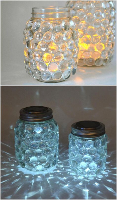 These solar mason jar luminaries are super easy to make and pretty to boot! Just use simple supplies from the craft store. #diycrafts Do It Yourself Decoration, Crafts Storage, Mason Jar Luminaries, Solar Mason Jars, Mason Jar Projects, Diy Jar Crafts, Wine Bottle Diy Crafts, Mason Jar Crafts Diy, Mason Jar Lighting