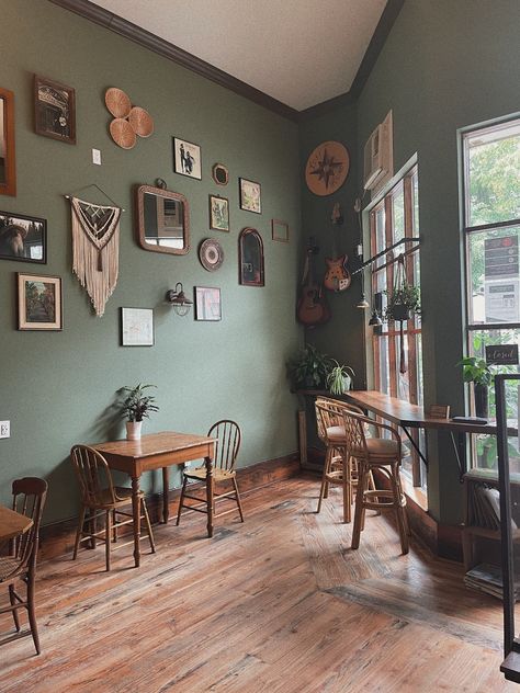 Green Wall House Interior Design, Sage Green Walls Dark Floors, Green Wall Coffee Shop, Coffee Shop Green Design, Medium Green Walls, Dark Wood And Sage Green, Safe Green Walls, Earthy Green Living Room Walls, Sage Green House Interior