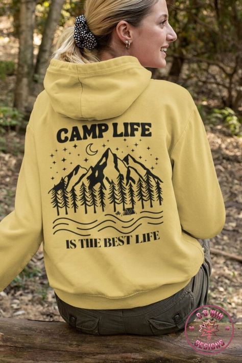 Stay cozy and stylish on your next camping trip with this hoodie featuring a fun camping graphic on the back and the saying "Camp Life Is The Best Life". Made with high-quality materials, this hoodie is perfect for keeping you warm around the campfire or just running errands in style. Order now and get ready to embrace the great outdoors with this comfy and trendy hoodie!-Camping Fashion, Camping Shirts Streetwear Hoodie Design, Camping Graphic, Aesthetic Camping, Nature Hoodie, Edc Wallet, Camping Hoodie, Around The Campfire, Witchy Wallpaper, Camp Life