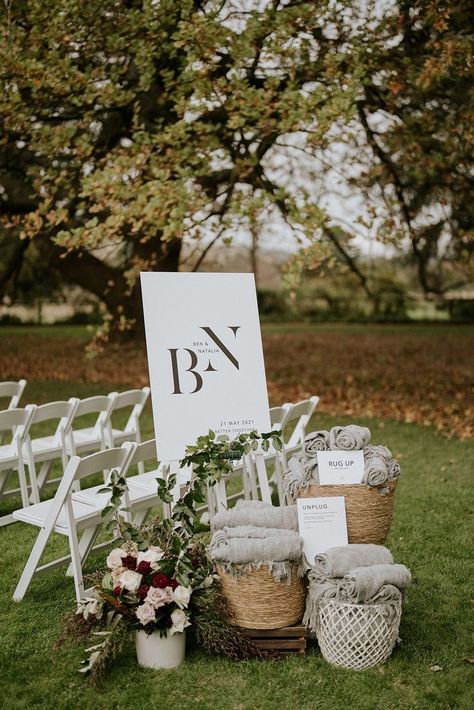 Civil Wedding Outdoor Ceremony, Welcome Sign Wedding Ceremony, Blanket Basket At Wedding, Wedding Venue Welcome Sign, Blanket Display Wedding, Blanket Basket For Wedding, Outdoor Wedding Ceremony Signing Table, Wedding Ceremony Blankets, Winter Wedding Blankets