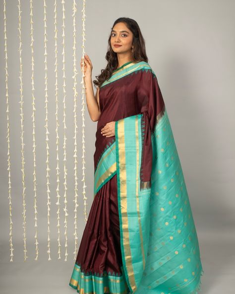 Gadwal In the allure of brown Gadwal silk, this saree embodies timeless sophistication, paired with a teal blue border. [Summer Collection, Gadwal silk saree, Tulsi Silks, Tulsi, Tulsi Weaves, Gadwal Pattu, Kutu Gadwal, Pure Silk Sarees, Handwoven silk saree, Trending silk saree, Gadwal sarees, Handwoven Gadwal] Saree Trending, Tulsi Silks, Gadwal Sarees, Lakshmi Images, Blue Border, Pure Silk Sarees, Teal Blue, Pure Silk, Silk Saree