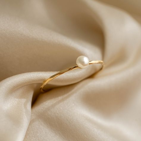 The Arden features a single freshwater pearl on a 14k gold band—romantic and elegant! Crafted in 14k gold. Freshwater pearl has a diameter of 3mm - 3.5mm. Puffy Heart Necklace, Mother Jewelry, London Blue Topaz Ring, Best Gifts For Her, Hammered Gold, Stacked Jewelry, Solid Gold Jewelry, Pearl Gemstone, Blue Topaz Ring