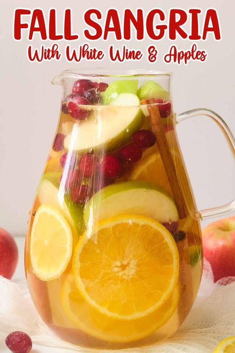 There are so many wonderful things to love about the fall season – from the beautiful colors of nature to the cool autumn weather. But one of my favorite things about fall are the seasonal flavors. With this simple fall sangria recipe, you can combine all the delicious fruit flavors of autumn into one beautiful cocktail. Apple Sangria Recipes, Thanksgiving Sangria, Fall Sangria Recipes, White Wine Sangria Recipe, White Sangria Recipe, Red Sangria Recipes, Easy Sangria Recipes, Holiday Sangria, Apple Sangria