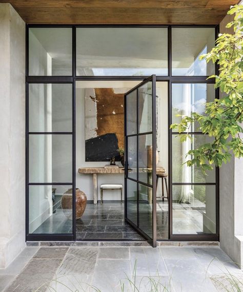 Pivot Doors Entry, Metal Windows, Copper Lantern, Modern Entrance, Pivot Doors, Luxe Interiors, Interiors Design, Ceiling Beams, Steel Doors